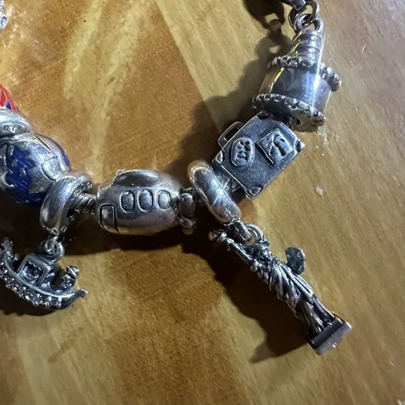 authentic Pandora Travelers charm bracelet. It’s a must have if u travel a-lot. - Picture 4 of 9